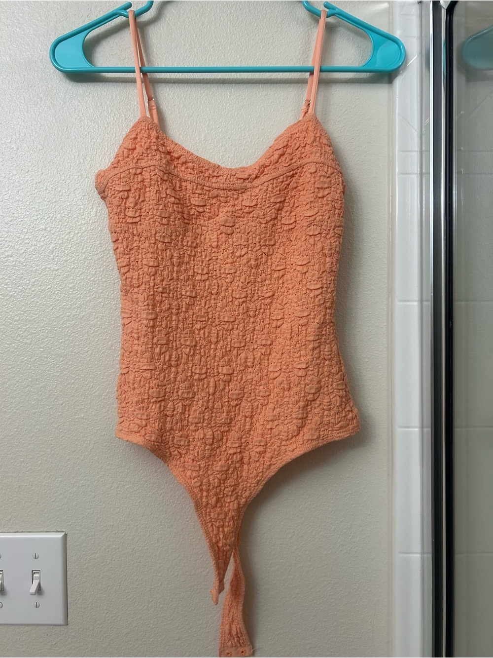 Textured Peach women’s One-Piece Bodysuit with Adjustable Straps